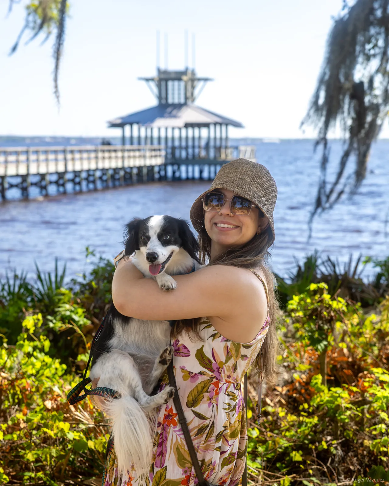 A fellow enjoying the Jacksonville waterfront with their dog