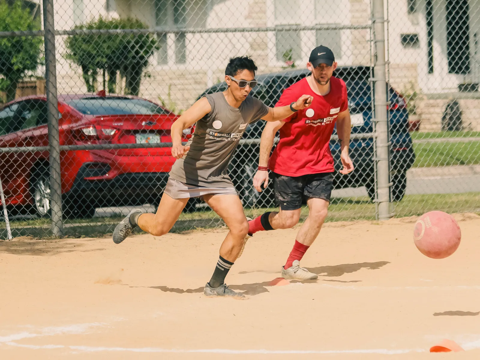 Players running the bases in a Jacksonville kickball league game